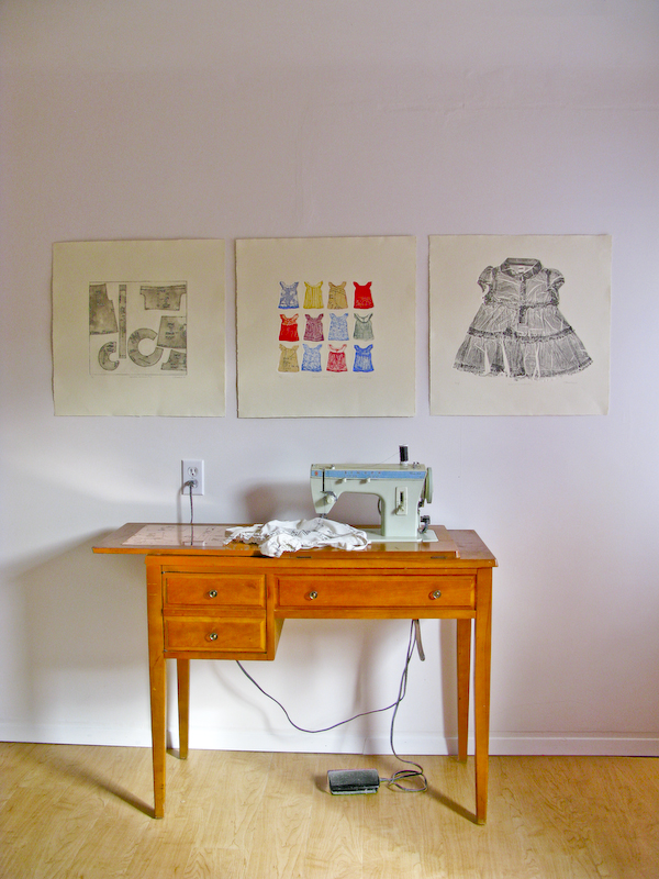 Gallery installation piece titled Sewing Lessons 2014 with sewing machine, etched copper plate, serigraph toddlers dress